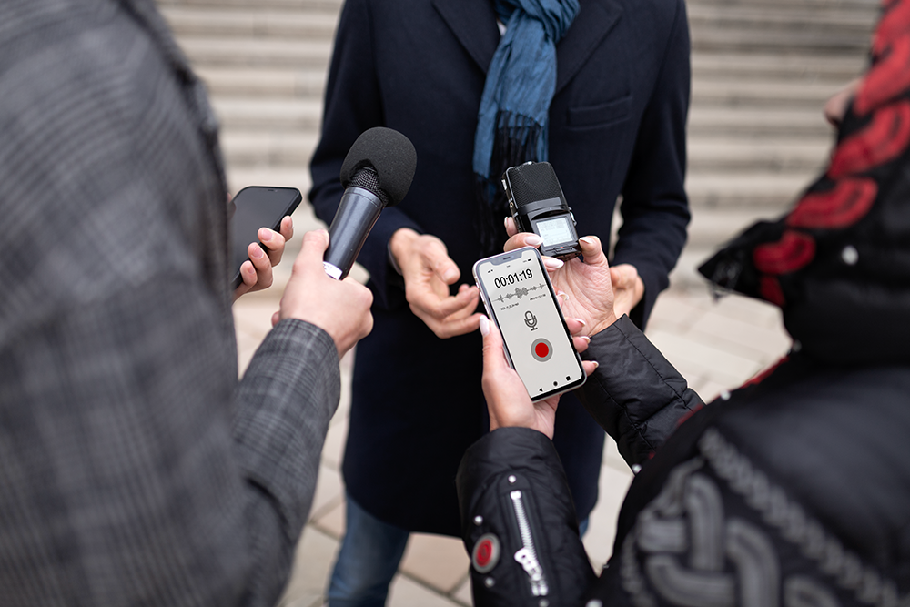 close up reporter taking interview